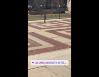 Guy throws water bottle with legs at Columbia University quad