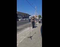 Woman pose on street tripod continuous camera sound