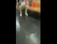 Man wears Eat Pussy Its Organic shirt on subway