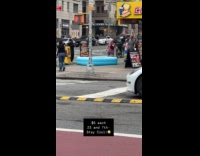 Heat wave inflatable pool setup on street 