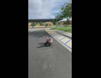 Collab ShredSlams - Guy jumps over rail with skateboard and falls on the street