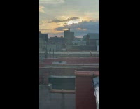 Two girls dance twerk rooftop neighbor sunset