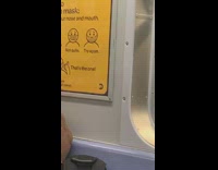 Brown shirt guy wears face mask wrong