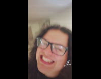 Girl reading her martin luther king paper second grade