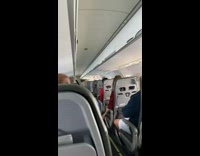 Person ride plane feet step on ceiling