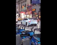 Swear and insult spray painted on car