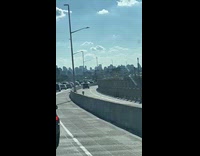 Car driving on the bike lane on bridge 