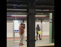 Man orange shirt sings Take on me in subway station