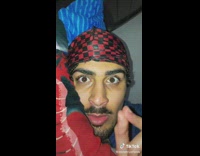 Man Talks Gibberish as He Lays on Bed