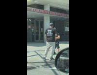 Guy wears shirt saying war bad boobs good