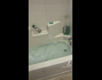 Guy throws folding chair into bathtub bath bomb 