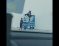 Rock star leg over blue hydraulic lift