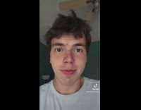 Guy white shirt joke balls in litter pretty nuts 