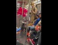 Guy wears Penny Wise costume rides subway 