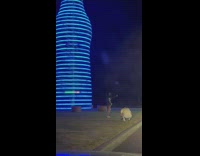 Woman take selfie bottle shape tower lights