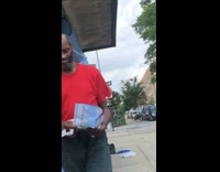 Guy wears blue pens on his ears 