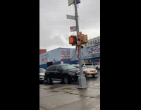 Blow up doll stuck on traffic light