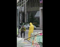Yellow hazmat suit quarantine painted utility box 