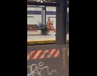 Guy shaves neck in subway 