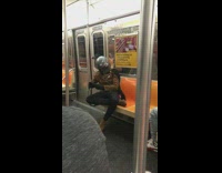 Guy on subway boba fett costume mask
