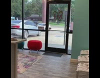 Little girl drives white toy car into dentist office when called into her appointment
