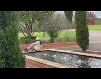 Leopard print dress girl black boots fountain 