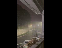 Guy sing let it go night street snow