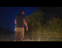 Man catch fish with bow mosquito swarm