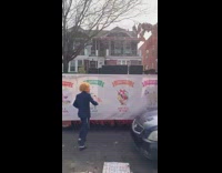 Guy wearing trump mask gets on platform 