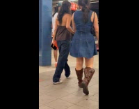 Man kneels at train platform does crunches