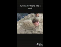 Guy with head in sand snail pictures 
