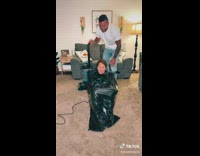 Guy sucks air out of bag mom is in 