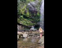 Man massage session by the waterfalls photoshoot