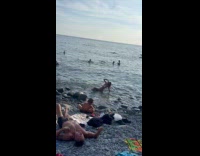 Collab IITW - Woman bikini poses on the beach rocks