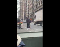 Guy photographs burger on black box 