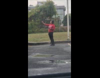 Collab IITW - Man red jacket with cup parking lot selfie