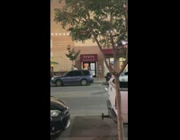 Camera girl walk backwards film three people