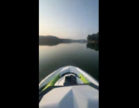Man rides jetski on glass like lake part 2