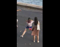 Woman white dress dancing with stuffed animal