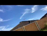 Straight jet stream in the blue sky