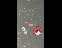L train pink heart sticker on floor