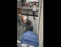 Girl tiktok dances train station black pants