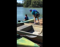Man in kayak slowly turned upside down