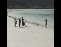 woman jumping running on ocean water