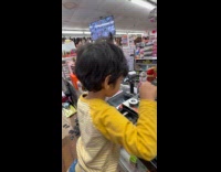 Submitter brings kid to work as cashier