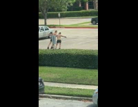 Man shirtless roller blades empty parking lot Part 2