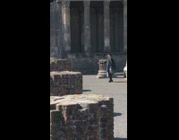 Collab IITW - Music video pompeii courtyard black jacket guy 