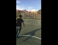 Guy trips and falls on basketball 