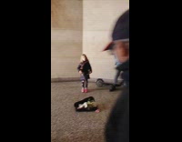 Little girl sings while guy plays guitar 