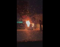 White van burns on the the street 